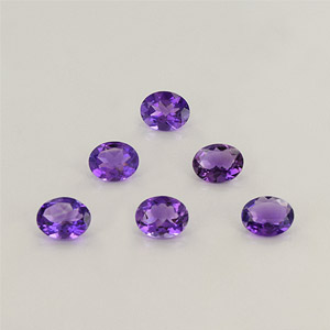 Natural 10x8x4.8mm Faceted Oval Amethyst