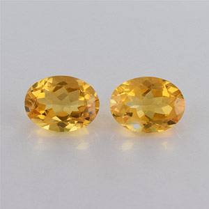 Natural 12x9x6.7mm Faceted Oval Citrine