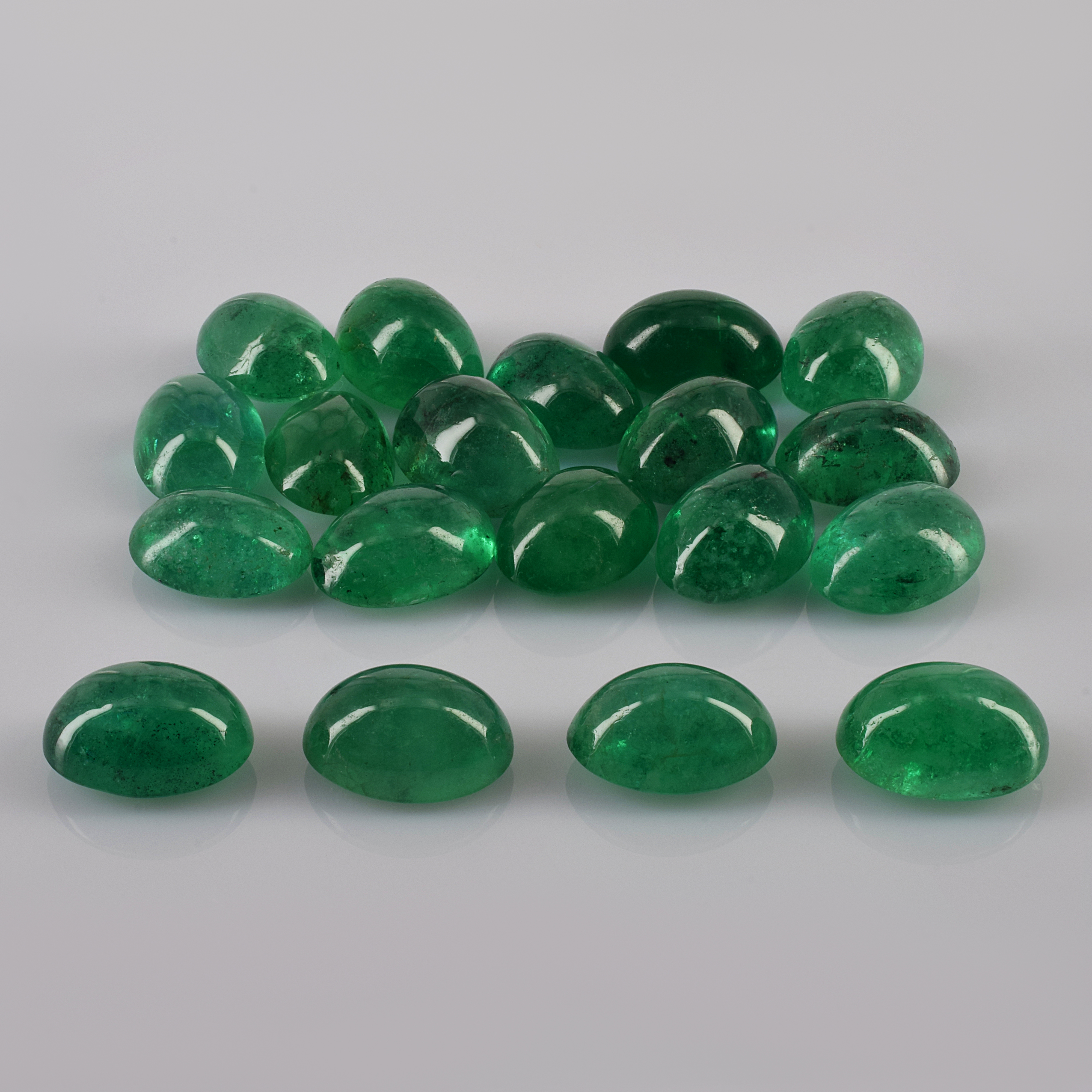 Natural 7x5x5.70mm Cabochon Oval Emerald