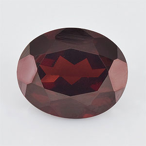 Natural 12x10x5.7mm Faceted Oval Garnet