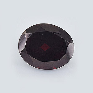 Natural 12x10x6.10mm Faceted Oval Garnet