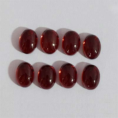 Natural 7x5x3.5mm Cabochon Oval Garnet