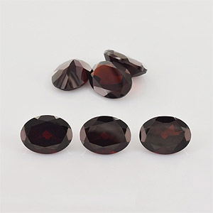 Natural 12x9x5.4mm Faceted Oval Garnet