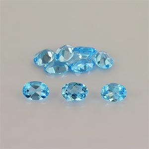 Natural 7x5x3.3mm Faceted Oval Topaz