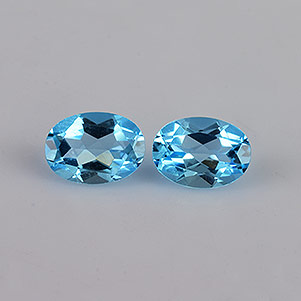 Natural 7x5x3.3mm Faceted Oval Topaz